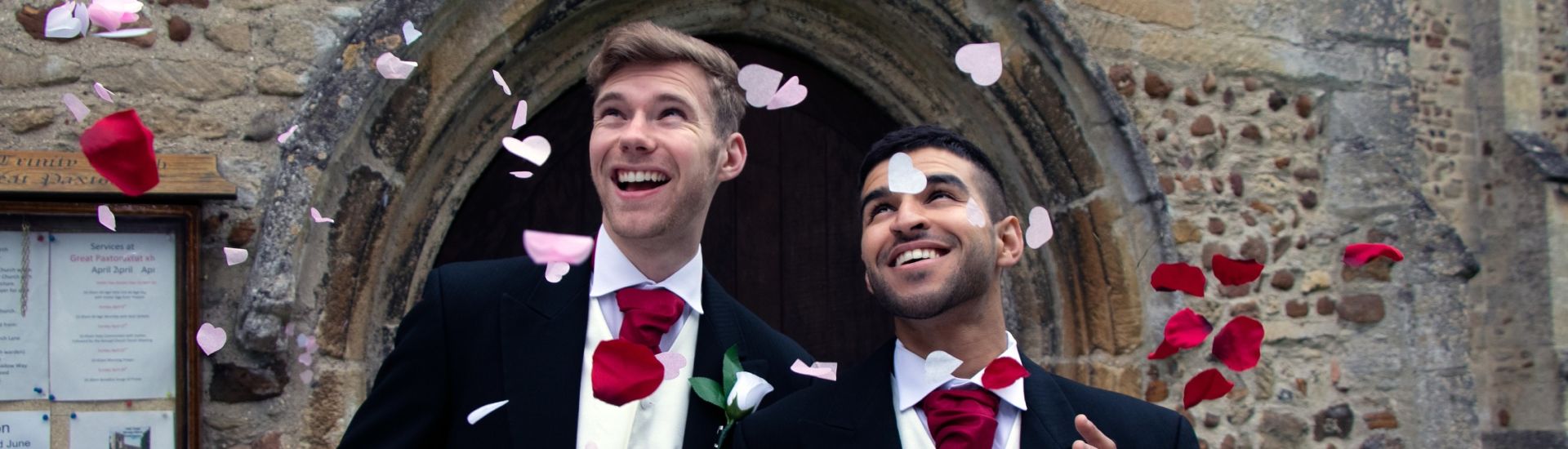 Gay wedding, grooms leave village church after being married to smiles and confetti