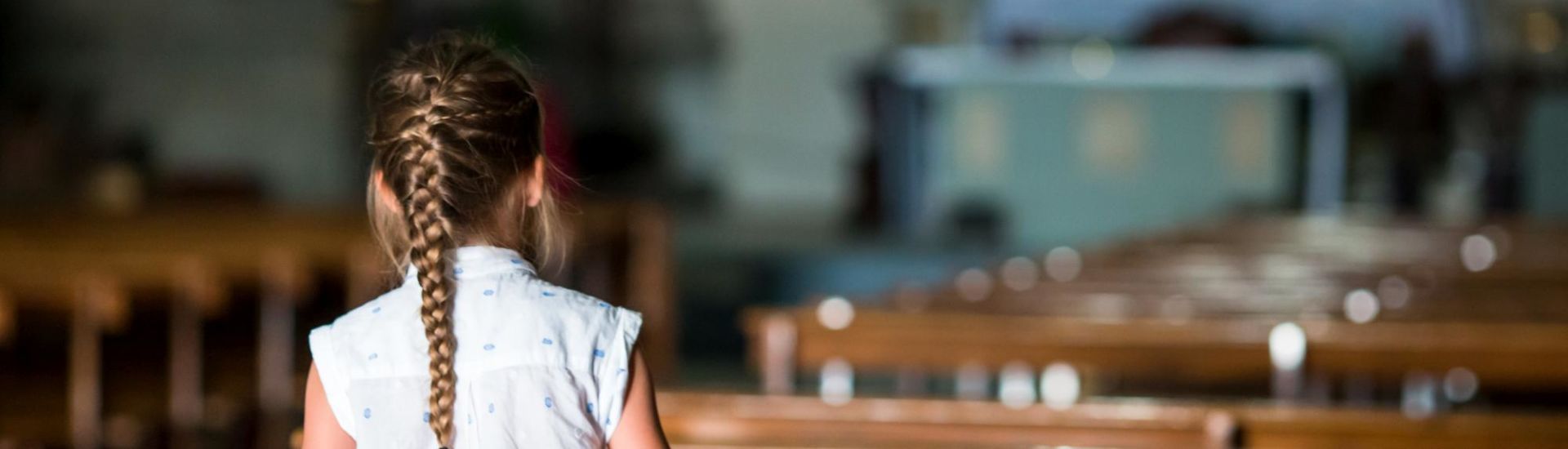 Child in beautiful old church in small italian city