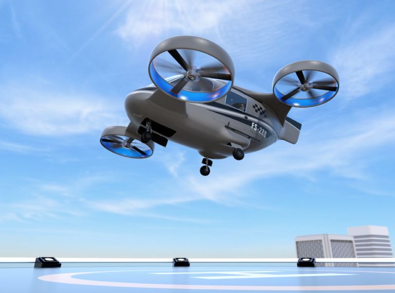 Metallic gray Passenger Drone Taxi takeoff from helipad. 3D rendering image.