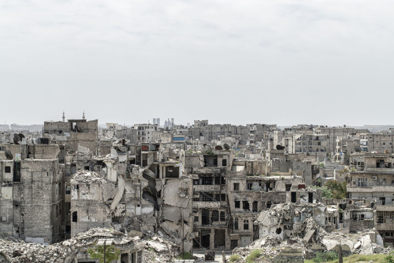 City of Aleppo and destroyed building in Syria 2019