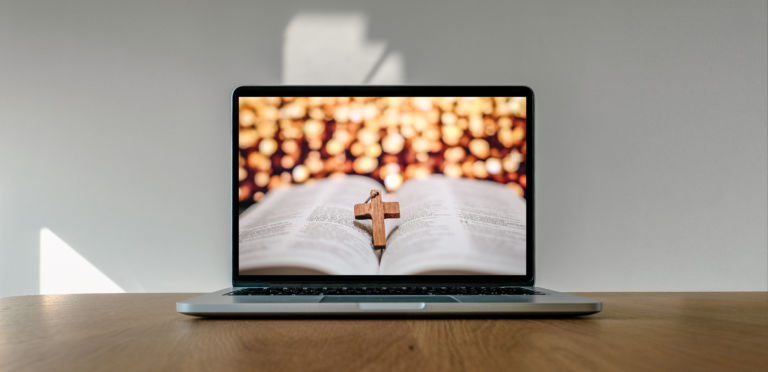 Worship from home, Online live church for sunday service, Laptop screen with cross and bible photo, quarantine for Covid 19 situation