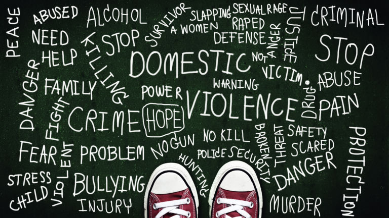 bullying children concept. red sneaker on chalkboard with keyword about bully problem in school campaign