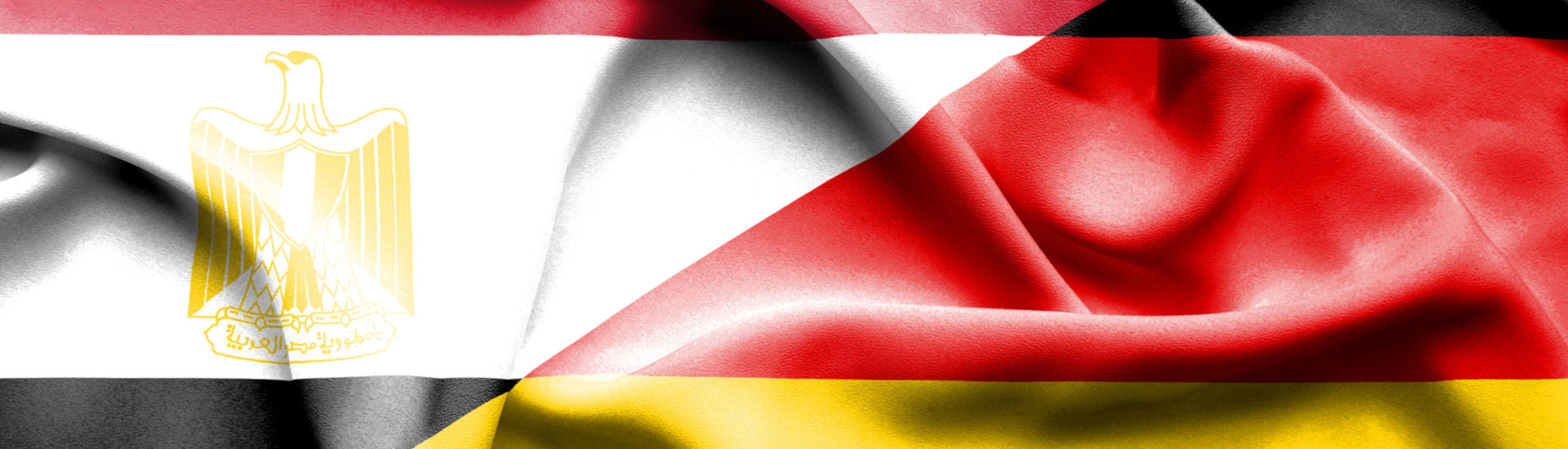 Waving flag of Germany and Egypt