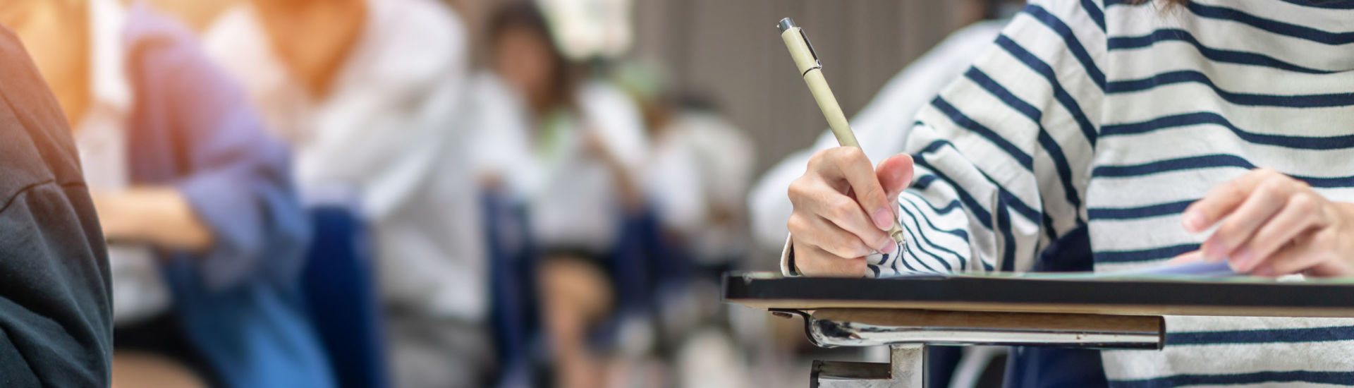 Exam at school with student’s taking educational admission test