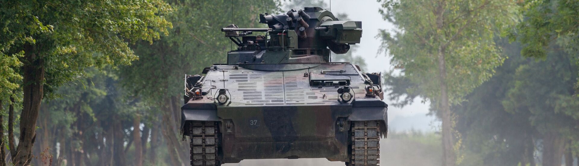 German infantry fighting vehicle drives on a road