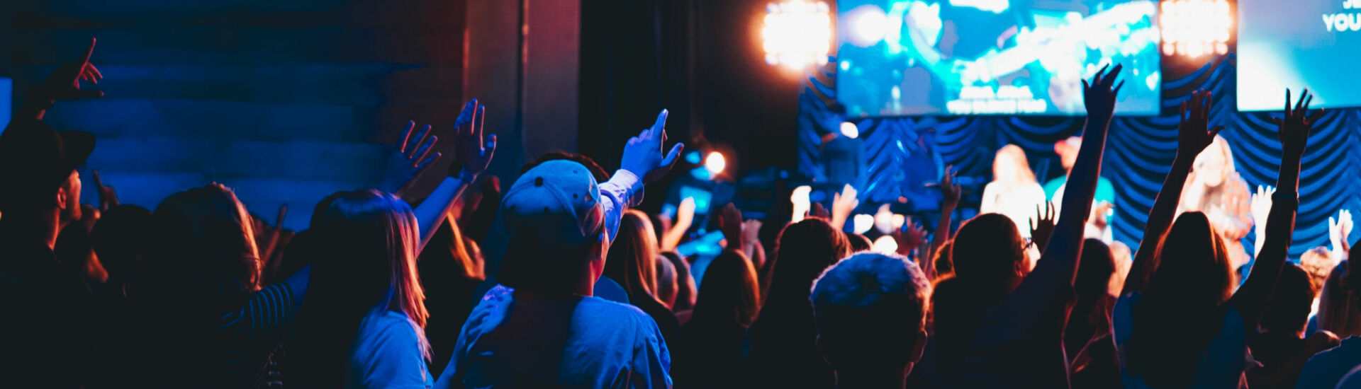 crowd of people at worship concert
