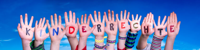Children Hands Building Word Kinderrecht Means Children Rights, Blue Sky