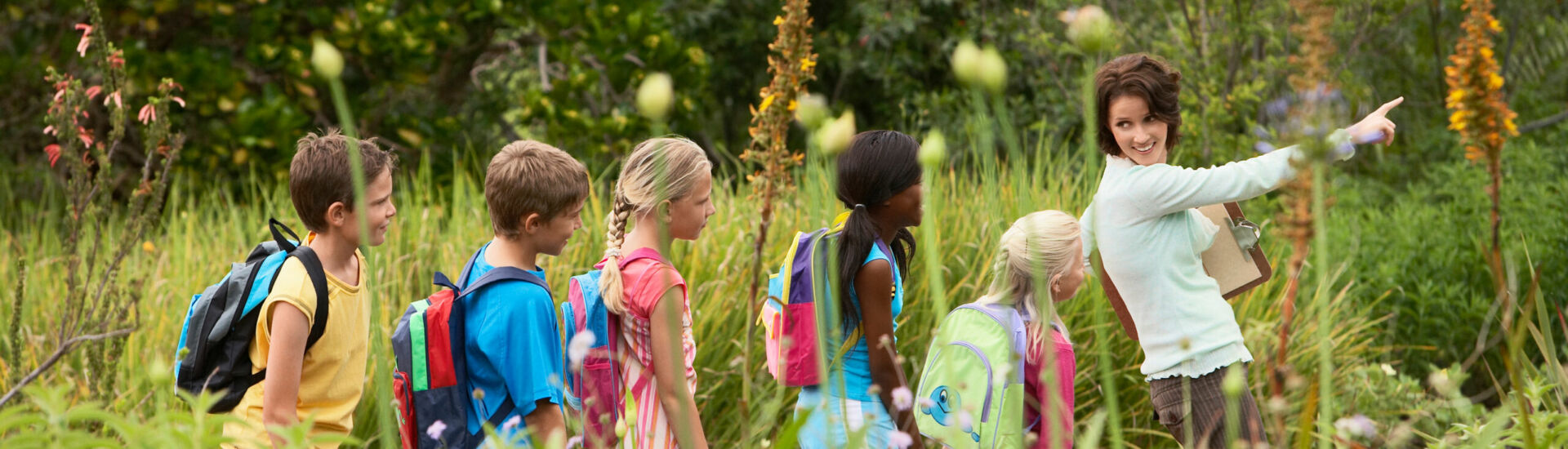 Teacher With Children On Field Trip