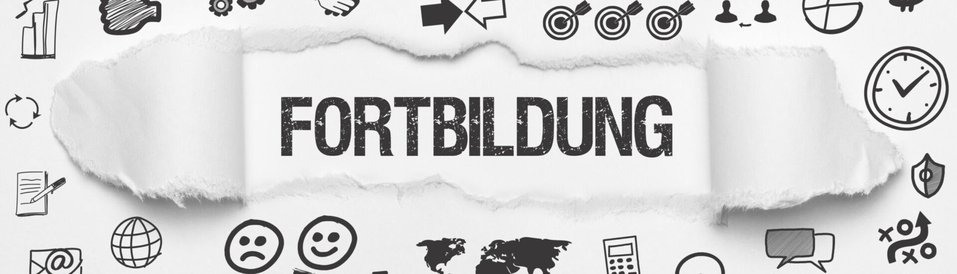 Fortbildung / weißes Papier mit Symbole