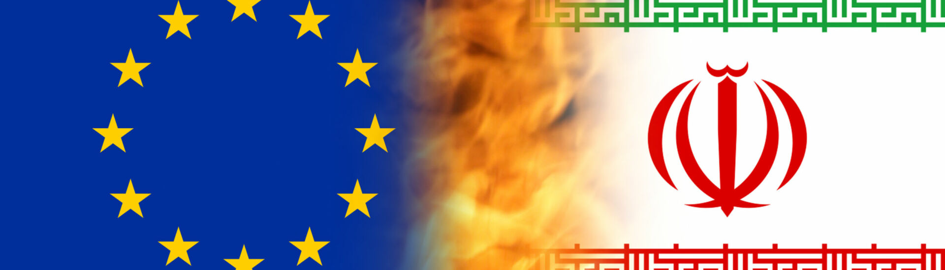 Defocus Iran sanctions concept. Iranian flag, concept on the top