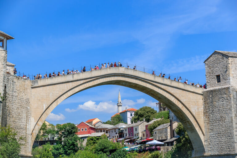 MOSTAR, BOSNIA HERZEGOVINA – 2017 AUGUST 16. The Old Bridge joins east and west Mostar and for many, tells a story of hope and reconciliation after the battle.