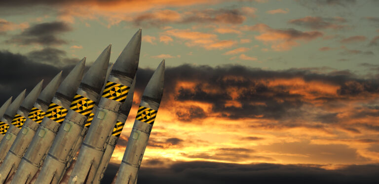 Nuclear missiles against the sky. The concept of the threat of nuclear war.