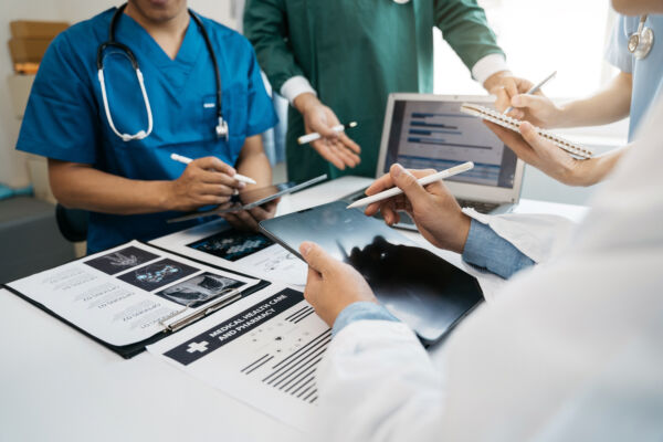 Medical team working on digital tablet healthcare doctor technol
